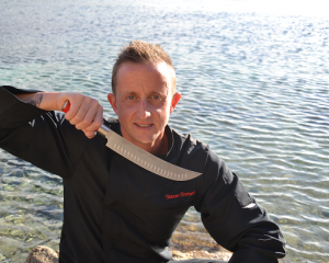 Sinnwell Chef con cuchillo en mano